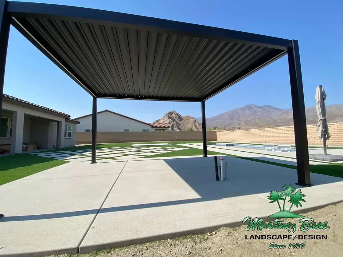 Modern louvered metal pergola over a patio