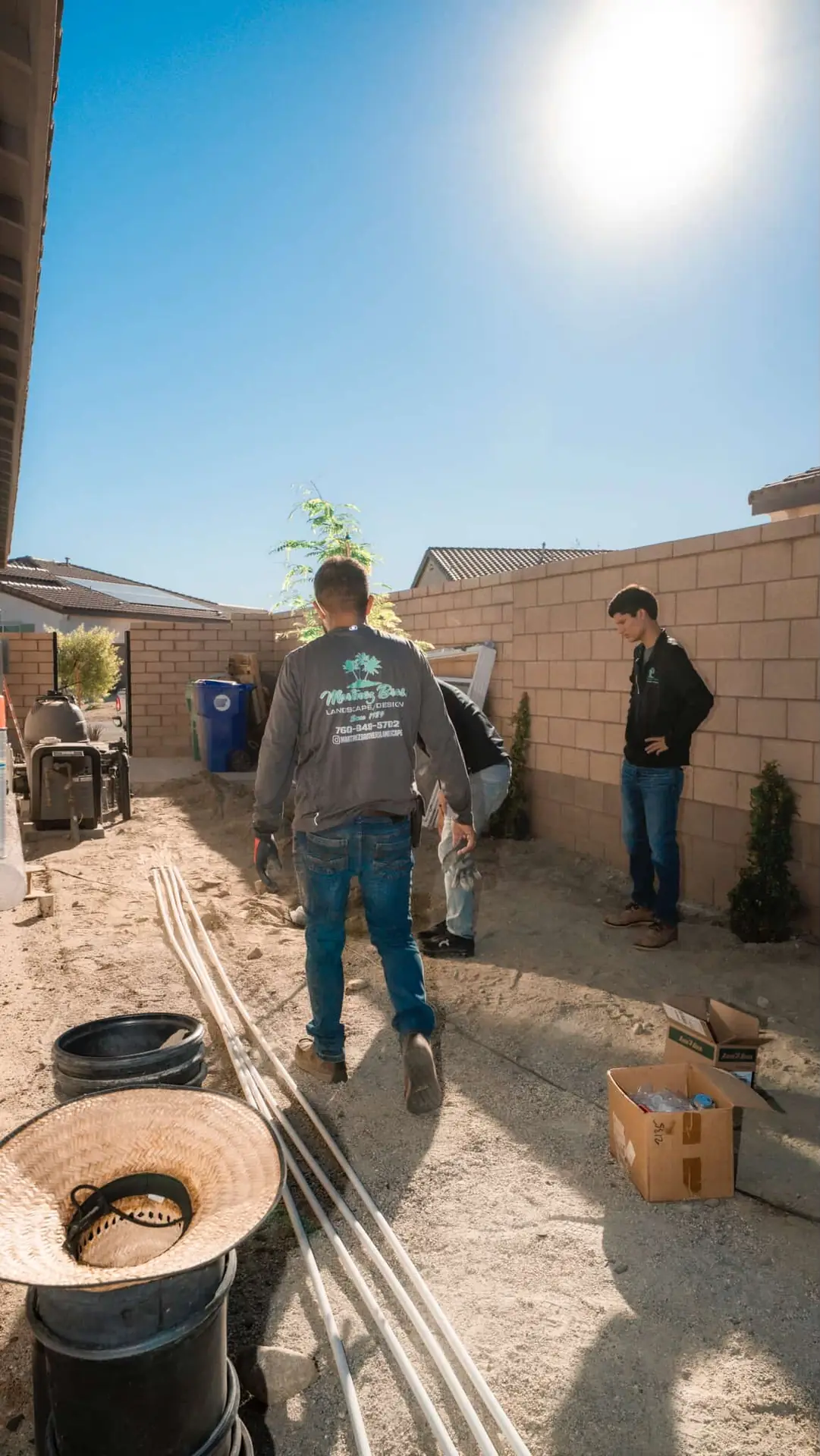 Crew installing landscape features